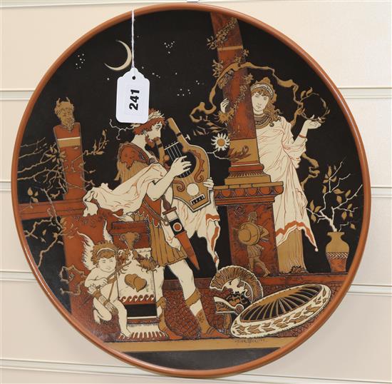 Heinrich Schlitt for Mettlach - two stoneware chargers, c.1900, diameter 39cm